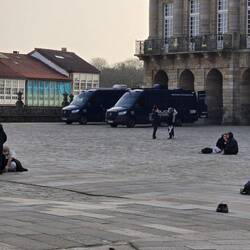 A fire at the police department has pressed these two vans into service for office work.