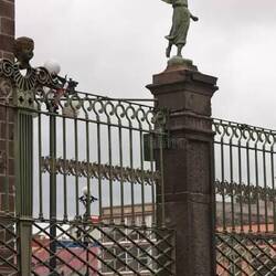 One of the angels on the fence