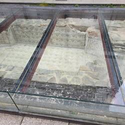 A protected pool, maybe an early babtistry in the cathedral plaza.