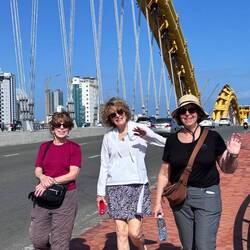 Jane, Kathleen and me crossing the dragon bridge in Danang