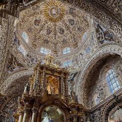 The light from the windows makes the gold leaf sparkle