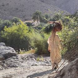 An omani lady close to the village.