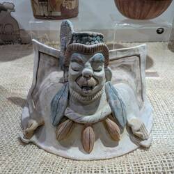 An ape deity who was strangled to become a cacao tree or something like that