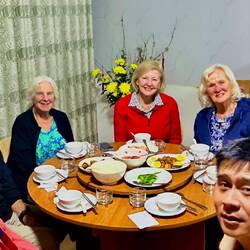 Host family with our group for dinner; kids ate separately