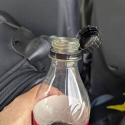 I love how Europeans attach the lids so they don't end up on the ground. We should do that!