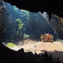 The cave dwarfs the pavilion