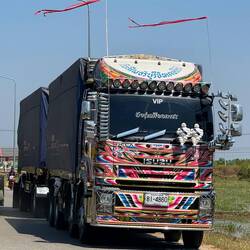 …and trucks on louder ones. Trucks often have bling - extra mirrors, tassels, Michelin men, painting