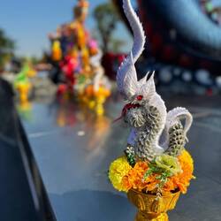 A handcrafted offering made from ribbon to seek blessings for wealth, career success, and protection