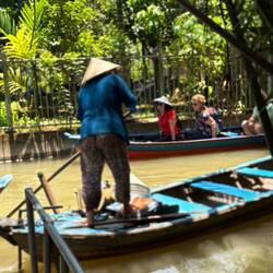 Riding a hand-poled sampan