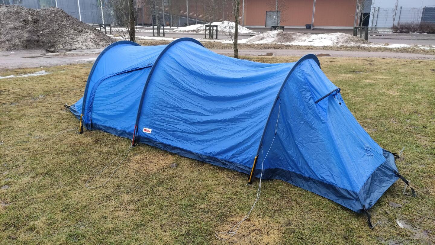 Pitching the rented tent one time at home. Now I have a bit bigger tent with me.