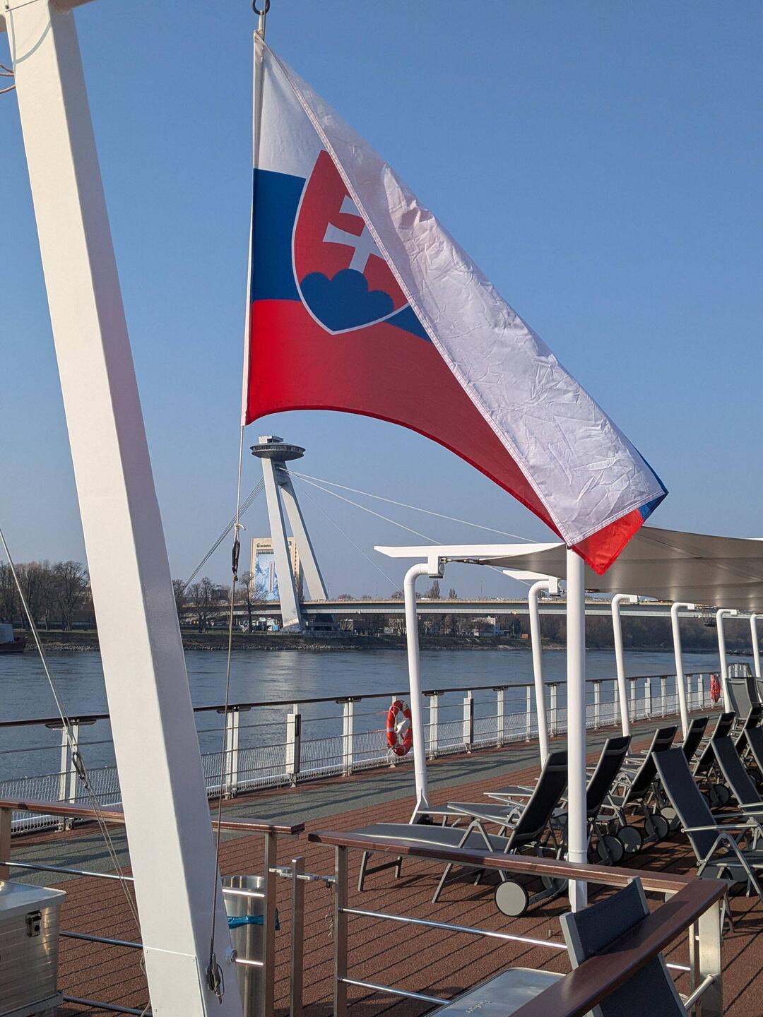Slovakian flag with the "UFO" bridge and restaurant, built by Soviets.