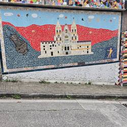 This mural of the cathedral is made of broken tiles.