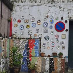 This wall is repurposed dinnerware.