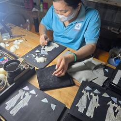 Handicapped handicrafts - many artists affected by agent Orange create art with eggshells & lacquer