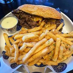Philly cheesesteak with truffle fries 🍟