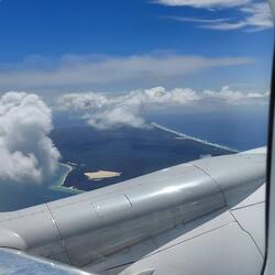 Leaving Brisbane and flying over Moreton Island