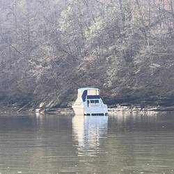 Nice boat anchored and tied up in this cove.