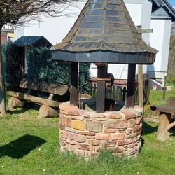 Dorfbrunnen in Holzfeld