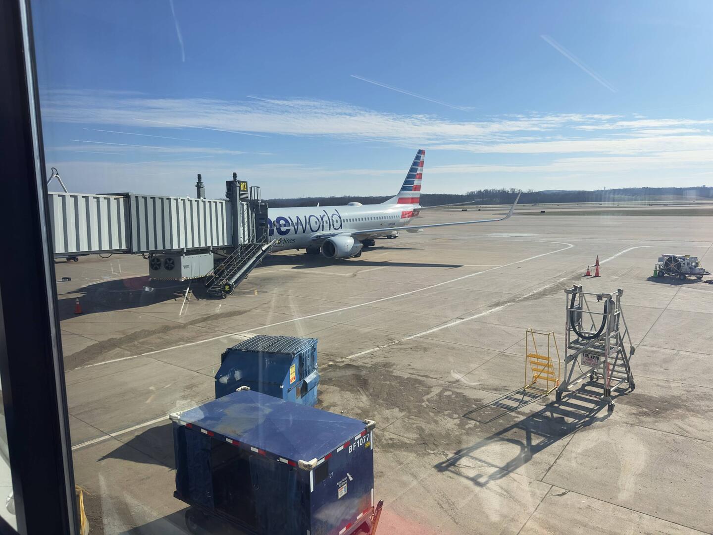 N973AN in OneWorld livery at the gate in PIT.