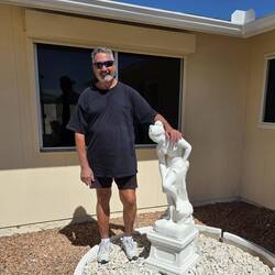 Tom with the Greek Goddess (😉) statue atop Connie & Ron's rental home in Sun City