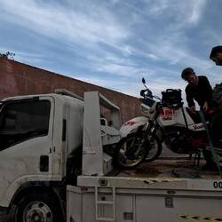 The trucker came and was in a rush. "Yalla, yalla", and he broke a spoke of Murghob's rear wheel.