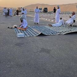 At a fuel station, preparing for Iftar - breaking the fast at sunset.