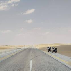 Dunes slowly eating the road