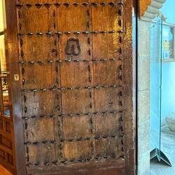 Door with threshing spikes