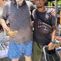 Wooden dragon for $10 and my worn-out pair of shoes.