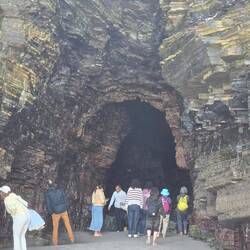 A cave where an arch is forming.