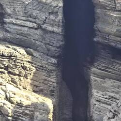 A Crack that looks like a cathedral window.