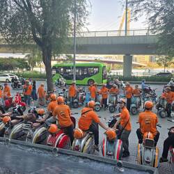 The sea of orange - our vintage vespa chariots await