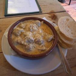 One of my lunch tapas plates: Catalan sausage in mustard sauce.