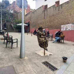 Street performer near the Park Guell exit.