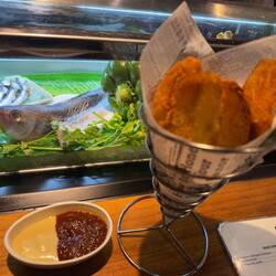 My dinner at Mercat de la Boqueria: patata bravas.