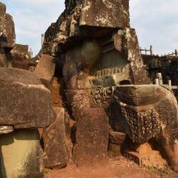 Parts of figurines on top of pyramid