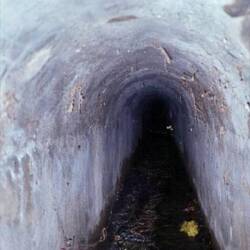 Acequia tunnel under the plaza (photo from the ADR)