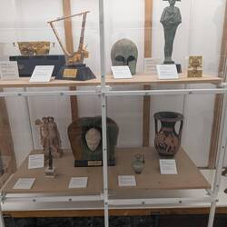 Some of the more ancient gifts given to him (Greek helmet, 400 BC).