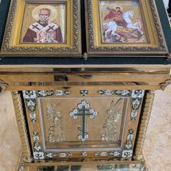 Russian icon holders given to the temple (multiple throughout)