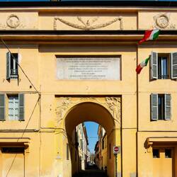 Arco del Follo, a historical gate with a Latin inscription to Napoleon, who visited in 1797.