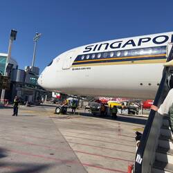 9V-SMJ at the remote bay at BCN waiting to operate as SQ377 to MXP and onwards to SIN.