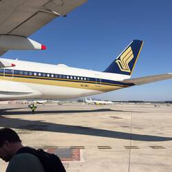 9V-SMJ at the remote bay at BCN waiting to operate as SQ377 to MXP and onwards to SIN.