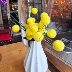 The table decorations remind me of wattle