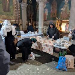 People bringing food to share with the family and each other.