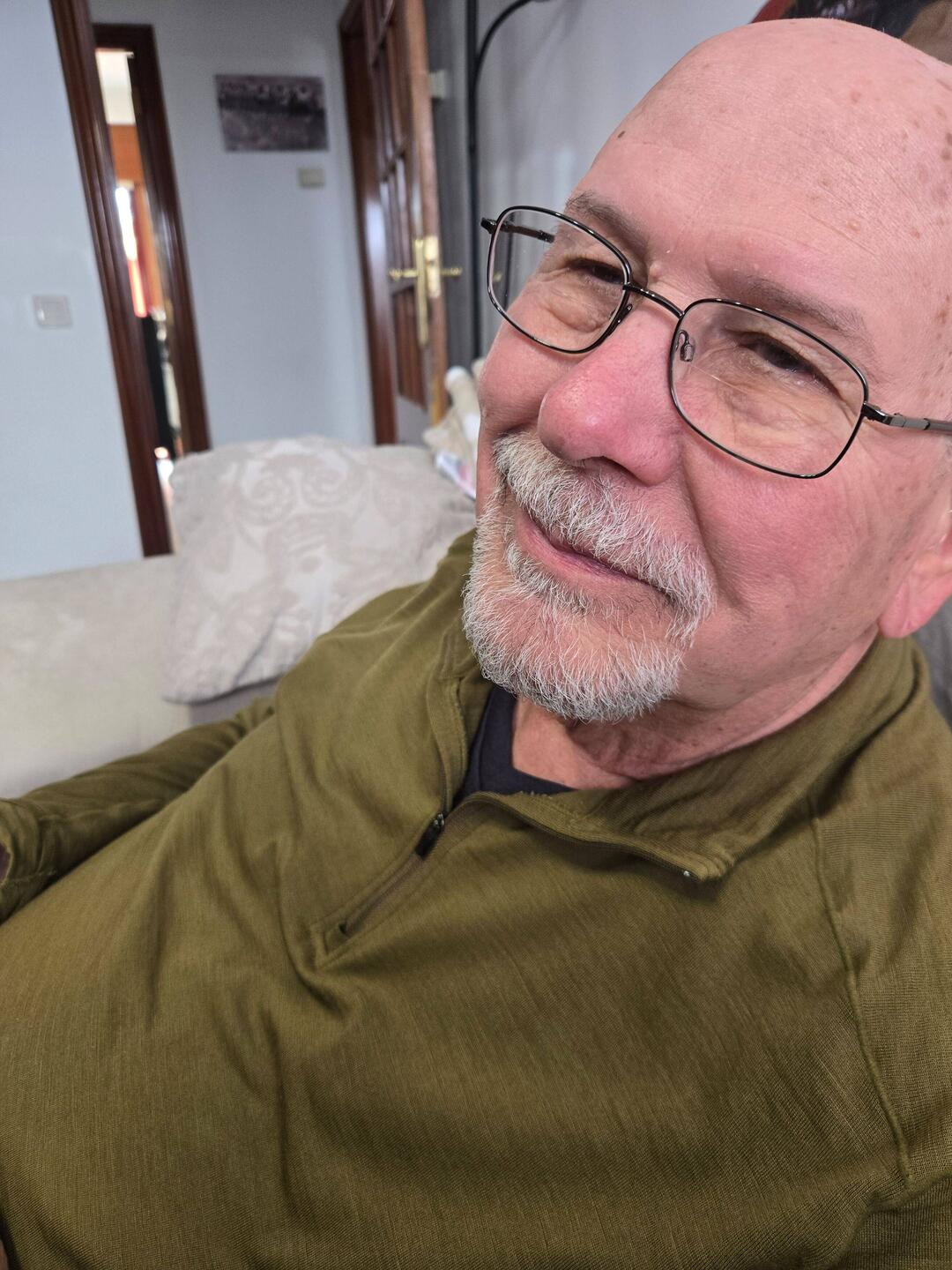 Phil with even less hair than usual and a trimmed beard.