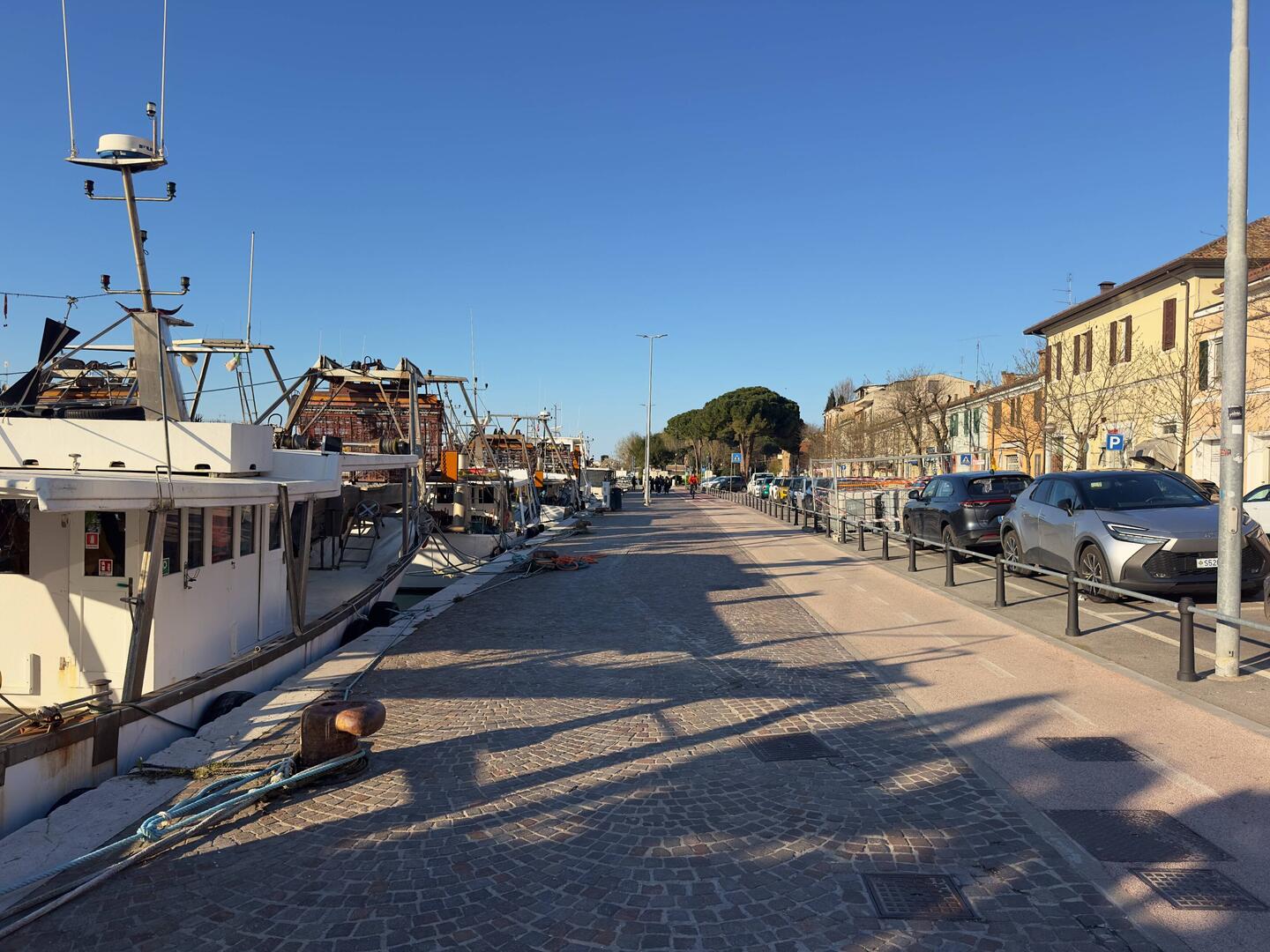 Walking past fishing boats en route to the Adriatic Seafront.