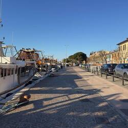 Walking past fishing boats en route to the Adriatic Seafront.