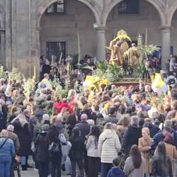 Everyone getting palms blessed.