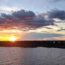 Watching the sun set; no 'flash'.