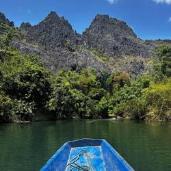Boat ride through the cave and along the river